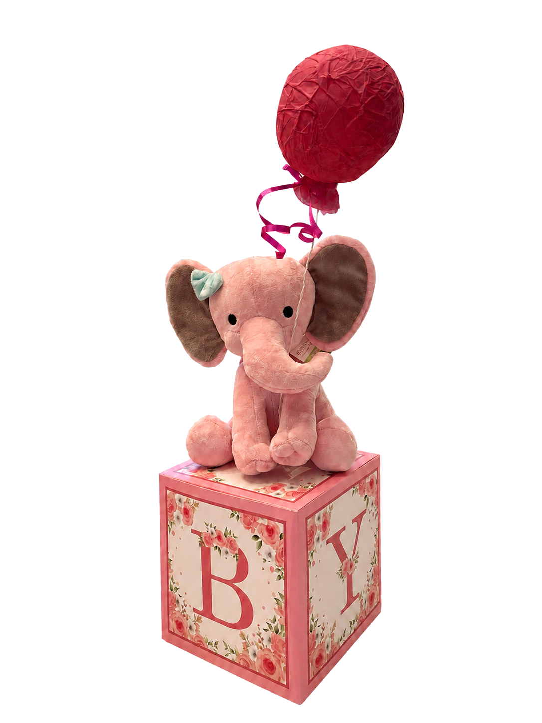 Pink elephant balloon baby-shower welcome display on a floral letter block